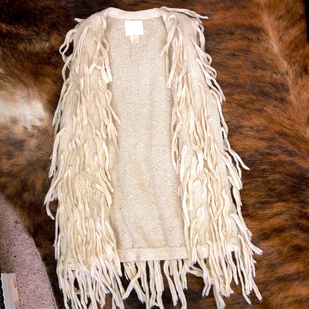 A VIBE! Super cool and unique sweater vest